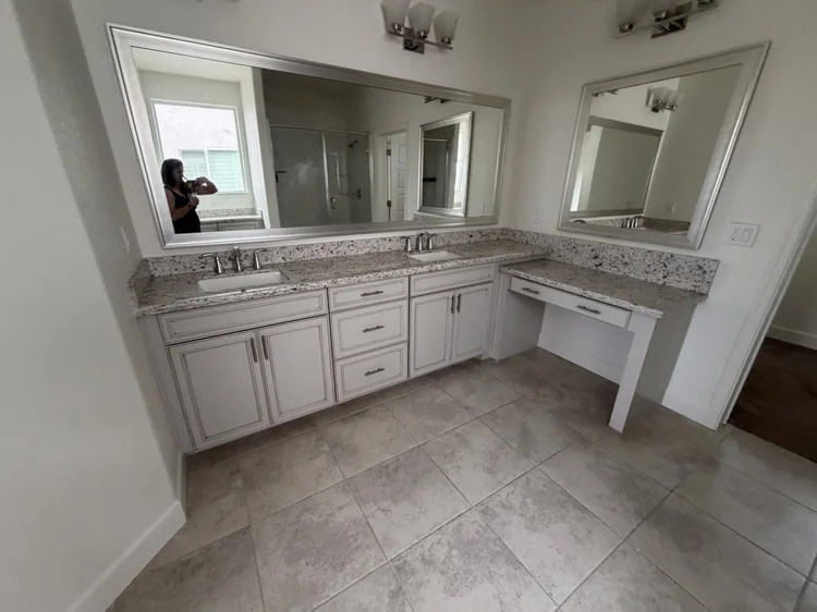 A bathroom with a double vanity.