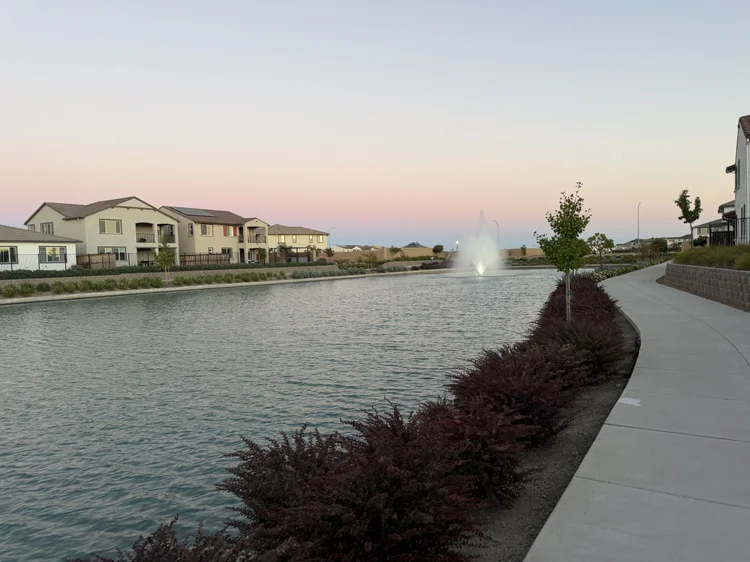 The walking path beside the neighborhood lake.